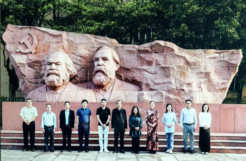 谢金峰常务副校长接见考察组一行并合影.jpg